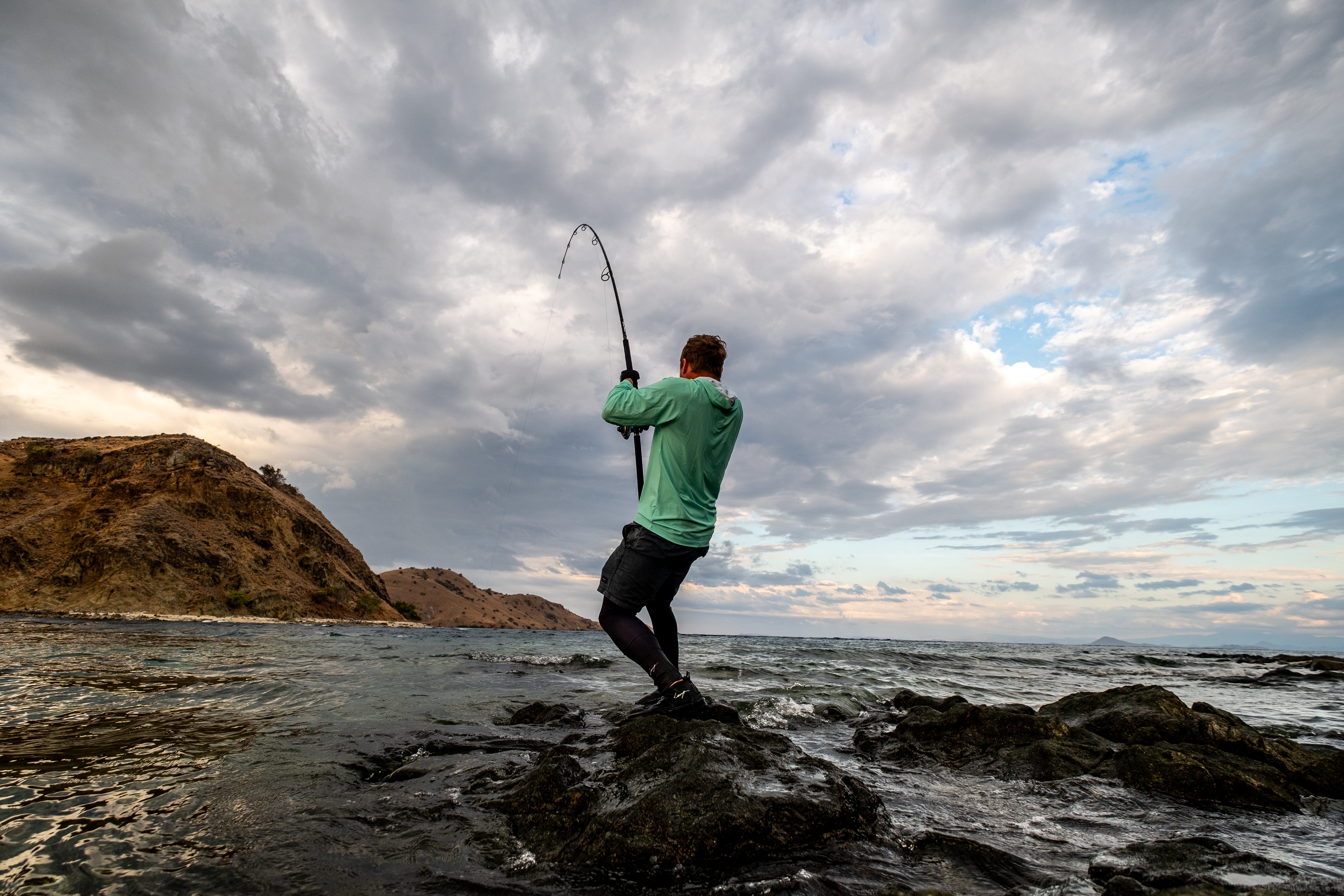 Adam Cavanagh surf fishing with handmade saltwater lure